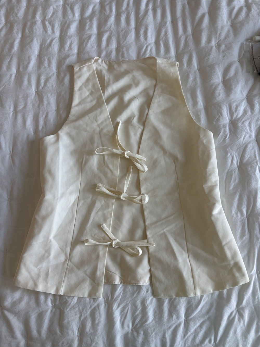 Cream bow vest top